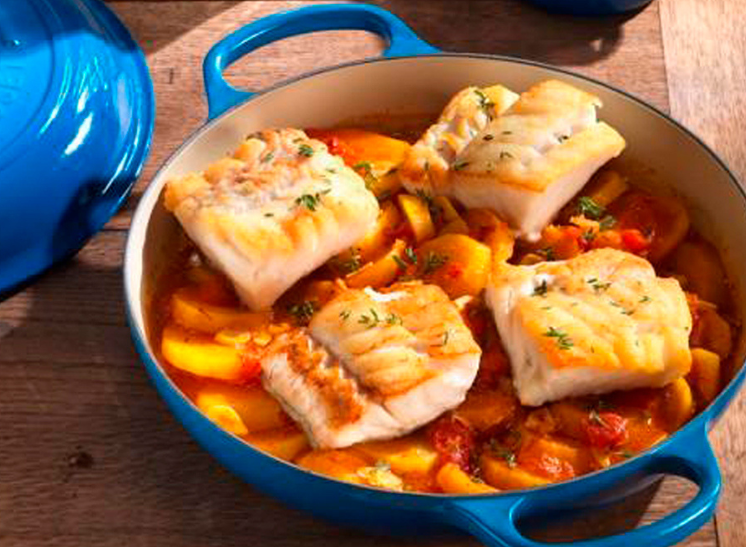 Cod Baked On Braised Saffron and Tomato Potatoes